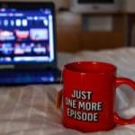 Netflix cup and laptop